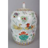 A CHINESE FAMILLE ROSE PORCELAIN JAR & COVER, the sides decorated with ducks in a lotus pond, 13in