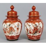 A PAIR OF JAPANESE KUTANI PORCELAIN VASES & COVERS, circa 1900, each painted with phoenix surmounted