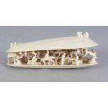 A SMALLER EARLY 20TH CENTURY ORIENTAL CLAM'S DREAM IVORY CARVING, 3in wide.