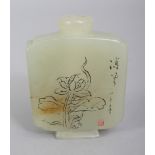 A SIGNED CHINESE JADE SNUFF BOTTLE, one side engraved with a signature, a seal and with a lotus
