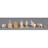A GROUP OF EIGHT EARLY 20TH CENTURY JAPANESE MINIATURE IVORY CARVINGS, the tallest 1.4in high. (8)