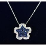 AN 18CT WHITE GOLD, SAPPHIRE AND DIAMOND PENDANT NECKLACE of 1.25cts.