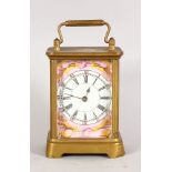A SEVRES STYLE BRASS AND PORCELAIN CARRIAGE TIMEPIECE. 4.25ins high.