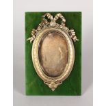A SUPERB RUSSIAN JADE AND SILVER PHOTOGRAPH FRAME with ribbons and oval photo. 5.5ins high, 3.