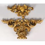 TWO 18TH CENTURY CARVED AND GILDED FRAGMENTS.