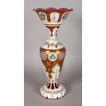 A GOOD LARGE 19TH CENTURY BOHEMIAN OVERLAY PINK VASE, painted with circular panels of flowers and