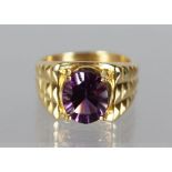AN 18CT YELLOW GOLD LARGE AMETHYST SET RING.