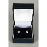 A PAIR OF WHITE GOLD DIAMOND STUD EARRINGS of 1.1cts.