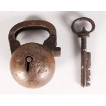 A 17TH CENTURY IRON LOCK AND KEY as a BALL. 2.5ins diameter.