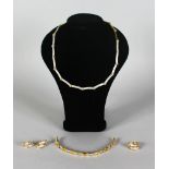 A SUPERB 18CT YELLOW GOLD AND DIAMOND SUITE OF JEWELLERY, comprising necklace, ring, bracelet and