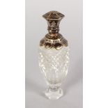 A HOBNAIL CUT FRENCH CRYSTAL SCENT BOTTLE with silver top. 3.75ins long.
