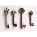 FOUR VARIOUS IRON AND STEEL KEYS. 6ins (2) and 4.5ins (2).