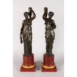 A SUPERB PAIR OF 19TH CENTURY FRENCH BRONZE FIGURES OF CLASSICAL LADIES, carrying pitchers and