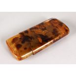 A BLONDE TORTOISESHELL CIGAR CASE.