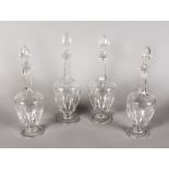 A GOOD SET OF FOUR SHERRY DECANTERS AND STOPPERS.