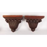 A VERY GOOD PAIR OF HEAVY CARVED WOOD BRACKETS, with egg and tongue moulding, and carved leaf
