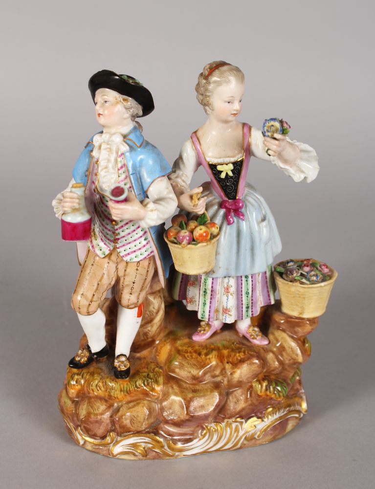A GOOD 19TH CENTURY MEISSEN FIGURE GROUP OF A YOUNG MAN AND LADY, the man carrying a bottle and
