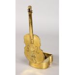 A SMALL BRASS CELLO SHAPED ASHTRAY. 5.75ins long.