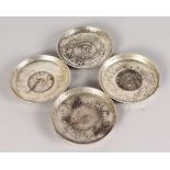 FOUR CHINESE COIN DISHES.