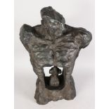 AN UNUSUAL ABSTRACT BRONZE TORSO OF A MAN, with inset female nude. 1ft 10ins high.