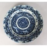 A CHINESE BLUE AND WHITE DISH. 16ins diameter.