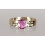 AN 18CT GOLD, PINK STONE AND DIAMOND RING.