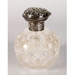 A CUT GLASS SCENT BOTTLE with silver top. London 1902.