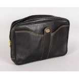 A DUNHILL LEATHER MEN'S WASH BAG. 8ins x 11ins.