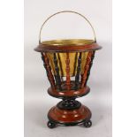A DUTCH MAHOGANY JARDINIERE, with brass liner, spindle supports on a turned base. 1ft 6ins high.