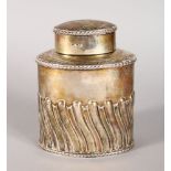 AN OVAL WRYTHEN FLUTED TEA CADDY. Sheffield 1908.