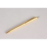 AN ASPREY 18CT GOLD ENGINE TURNED PROPELLING PENCIL, with Asprey cloth pouch.