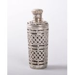 A 19TH CENTURY CUT CRYSTAL SCENT BOTTLE with silver stopper and pierced silver case, 7cms.