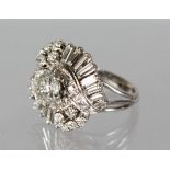 A VERY IMPRESSIVE 18CT WHITE GOLD DIAMOND COCKTAIL RING, the central stone of 2.4cts, surrounded
