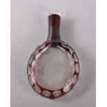 A GOOD BOHEMIAN FLAT CIRCULAR ENGRAVED GLASS SCENT BOTTLE, red and clear glass, CIRCA. 1900. 8cms.