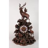 A VERY GOOD BLACK FOREST CARVED WOOD CLOCK, wood brass movement, stamped P R 1733, striking on a
