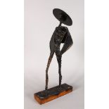 BRIAN BURGESS A MEXICAN FIGURE on a wooden base. Signed and dated 1969. 24ins high.