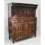 A GOOD 18TH CENTURY OAK COURT CUPBOARD of good colour, the top with three panel doors on a base with