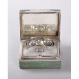 A MINIATURE 18TH CENTURY SHAGREEN PERFUME CASE, the lid with an oval miniature, inside are two