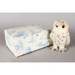 A STEIFF "WALLLY SNOWY OWL", numbered 1019 of 1500, 6ins long, boxed with certificate.