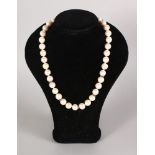 A STRING OF PEARLS with diamond sections.