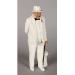 A ROYAL DOULTON FIGURE, "SIR WINSTON CHURCHILL", HN3057, Designed by A. Hughes. First Issued 1985.