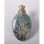 A FRENCH BLUE AND YELLOW FLECKED GLASS SCENT BOTTLE with gilt metal mounts, ring and chain, CIRCA.