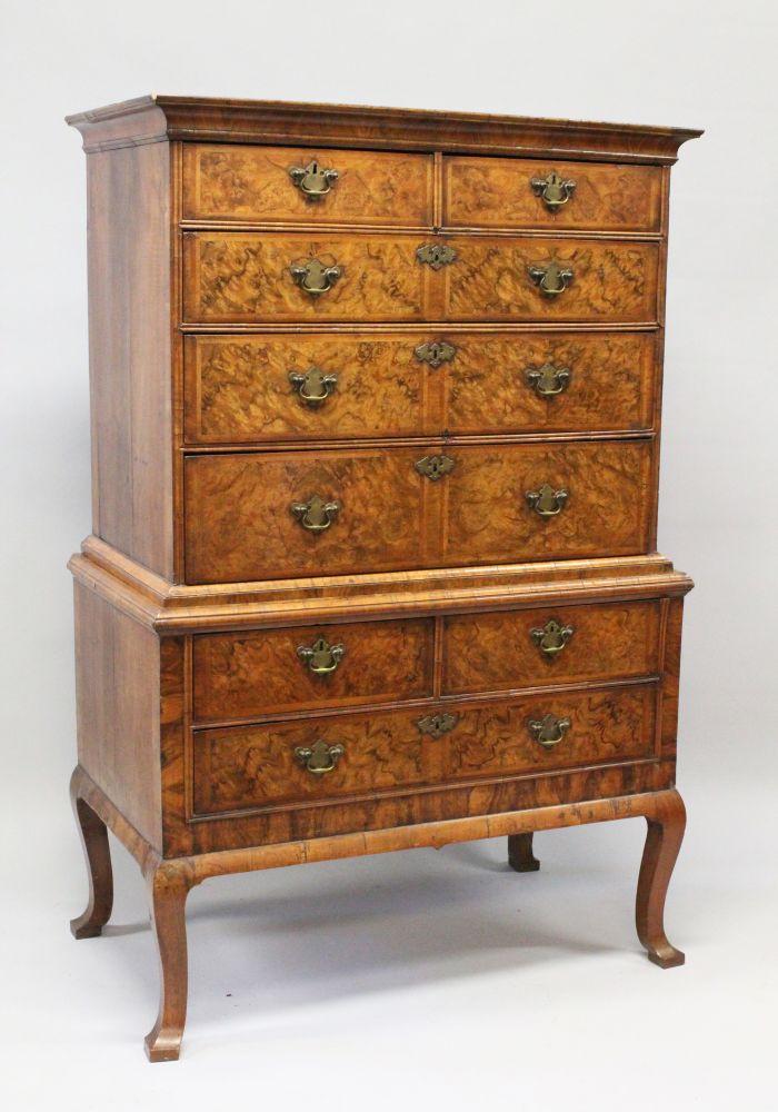 A GOOD 18TH CENTURY WALNUT CHEST ON STAND, the top with two short and three long drawers, on a