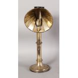 A 19TH CENTURY SILVER PLATED DESK LAMP, with shaped reflector on a turned support, signed MILLERS,