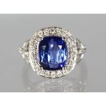 A SUPERB 18CT WHITE GOLD, TANZANITE AND DIAMOND RING, 4ct tanzanite and 1ct of diamonds.