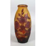 A GALLE STYLE VASE, decorated with flowers. 10.5ins high.