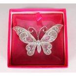 A BUTLER & WILSON BUTTERFLY BROOCH, boxed. 3ins long.