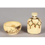 A SMALL JAPANESE IVORY CIRCULAR BOWL, 1.5ins diameter, and A SILVER IVORY SCENT BOTTLE, 1.75ins high