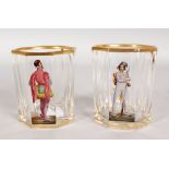 A GOOD PAIR OF AUSBURG BEAKERS, painted with a courtier and a soldier.
