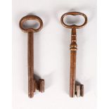 TWO 17TH CENTURY IRON KEYS. 6ins and 5.5ins.